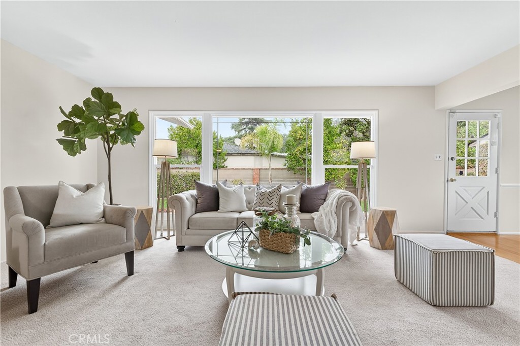 1005 West 20th Street Santa Ana, CA 92706 - Photo 2 of 28 Spacious living room with large windows looking onto the backyard