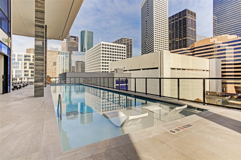 1211 Caroline Street, Unit 1708 Houston, TX 77002 - Photo 12 of 30 a view of a balcony with two windows