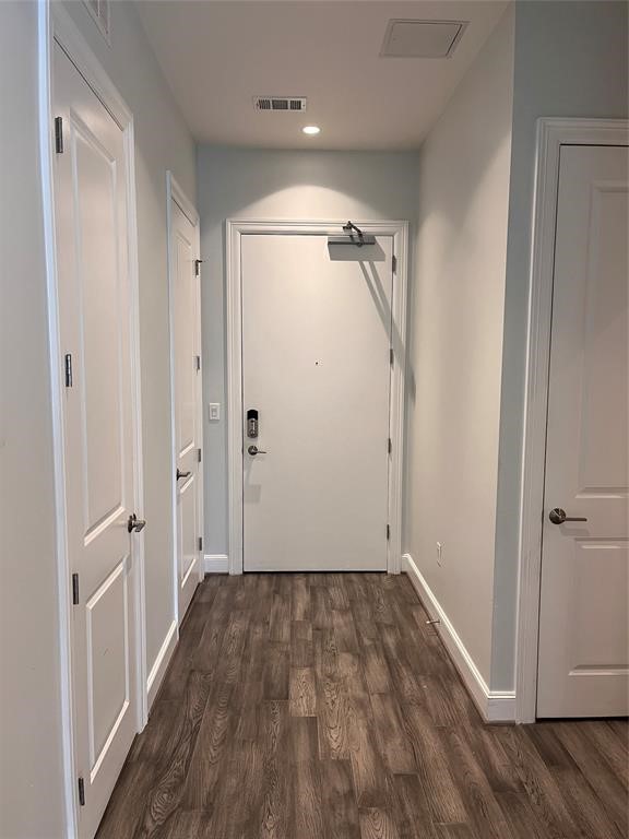 1211 Caroline Street, Unit 1708 Houston, TX 77002 - Photo 15 of 30 wooden floor in an empty room