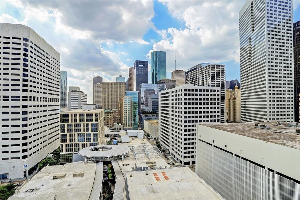 1211 Caroline Street, Unit 1708 Houston, TX 77002 - Photo 2 of 30 a view of a city with tall buildings