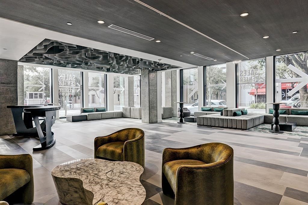 1211 Caroline Street, Unit 1708 Houston, TX 77002 - Photo 29 of 30 a living room with furniture and a large window