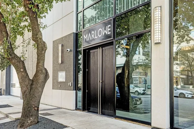 a street sign on a pole on a street