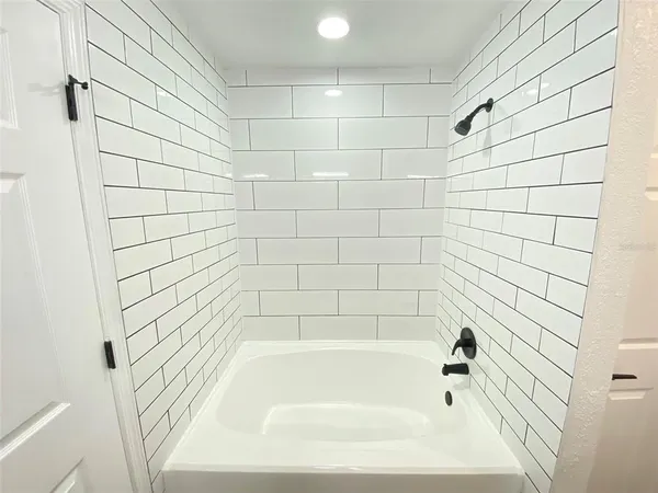 a bathroom with a bathtub