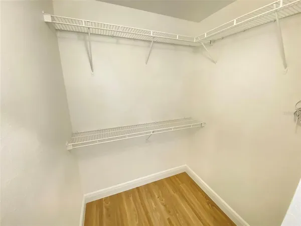 a view of a room with racks on the wall