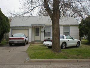 4213 Cline Road Amarillo, TX 79110 - Photo 1 of 1 a car parked in front of white house