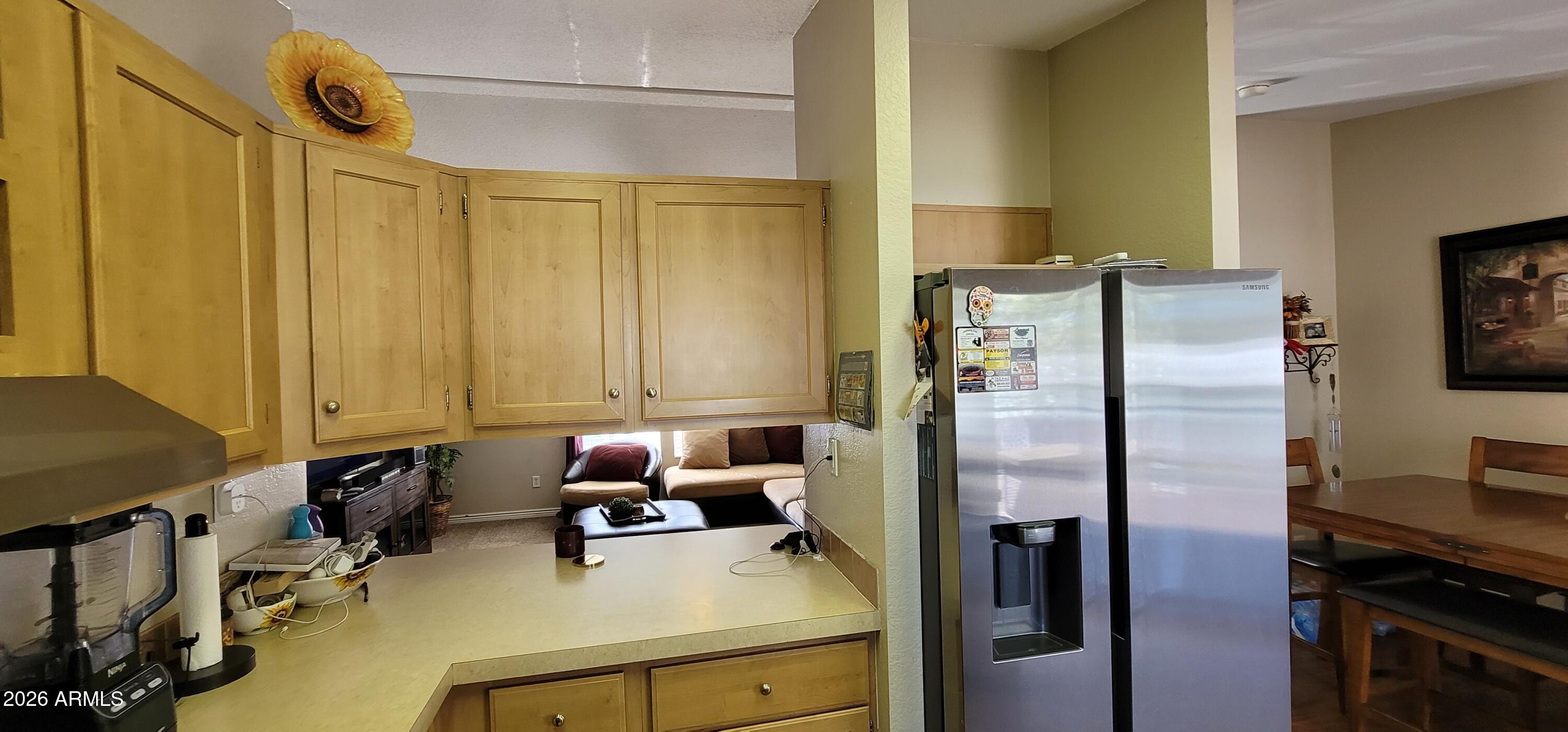 112 East Pine Street Payson, AZ 85541 - Photo 16 of 58 a kitchen with stainless steel appliances a refrigerator and a stove