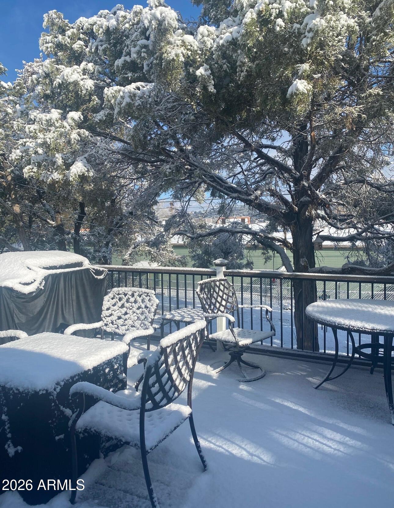 112 East Pine Street Payson, AZ 85541 - Photo 2 of 58 a view of a chairs and table on the deck