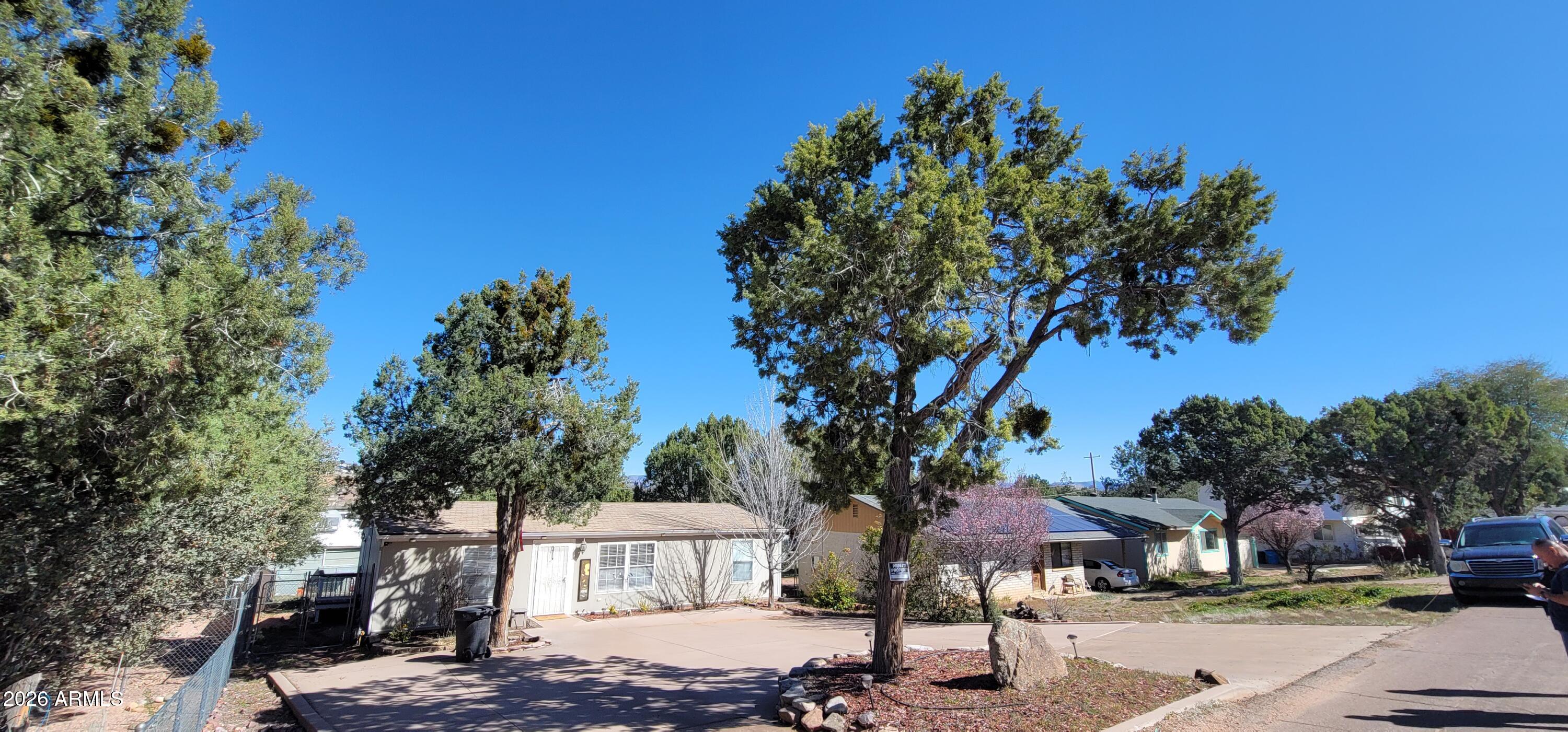 112 East Pine Street Payson, AZ 85541 - Photo 3 of 58 a front view of a building with trees around