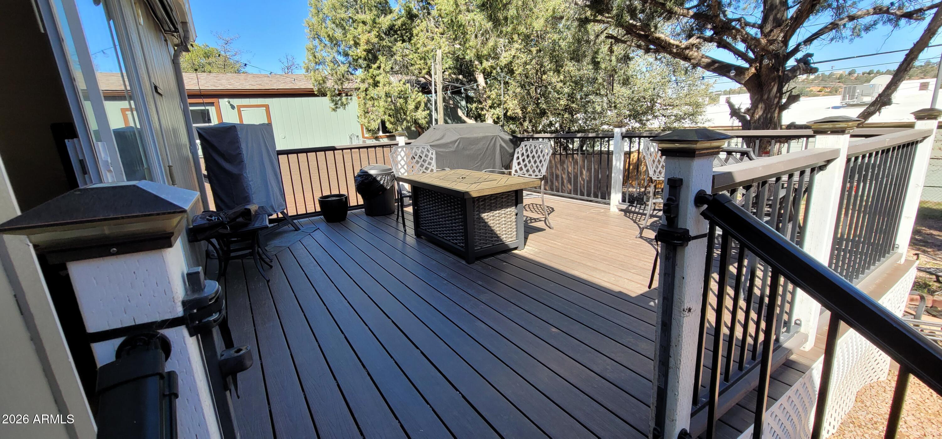 112 East Pine Street Payson, AZ 85541 - Photo 40 of 58 a view of a balcony with furniture and wooden floor