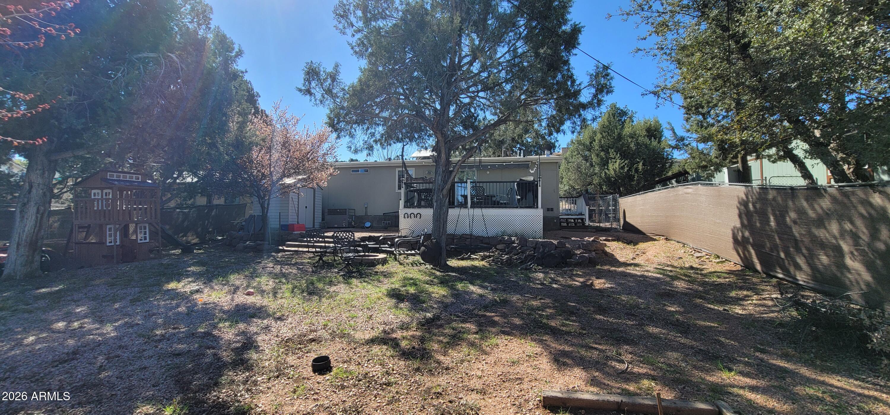 112 East Pine Street Payson, AZ 85541 - Photo 48 of 58 a view of a yard with plants and trees