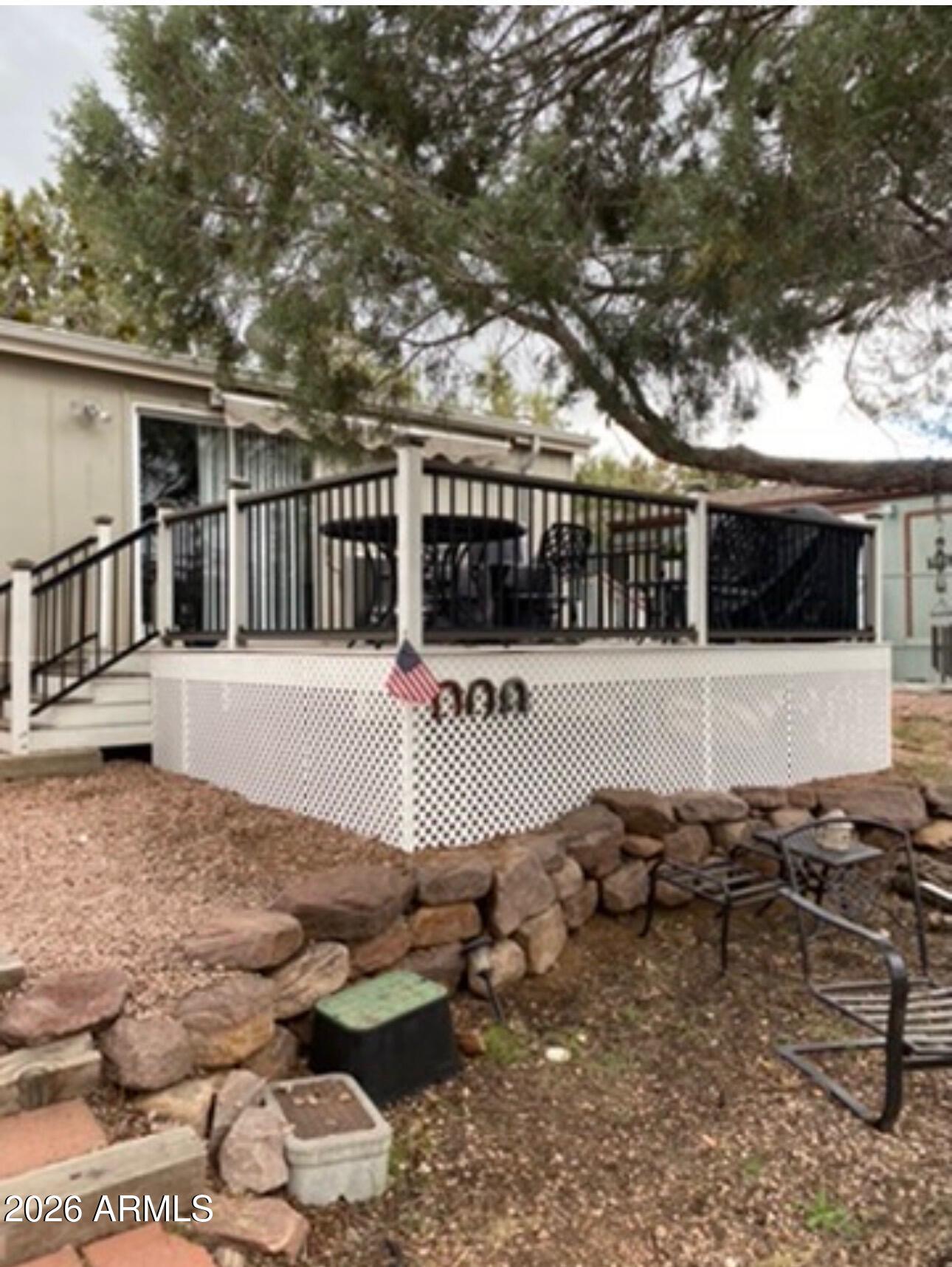 112 East Pine Street Payson, AZ 85541 - Photo 56 of 58 a view of a house with backyard and sitting area
