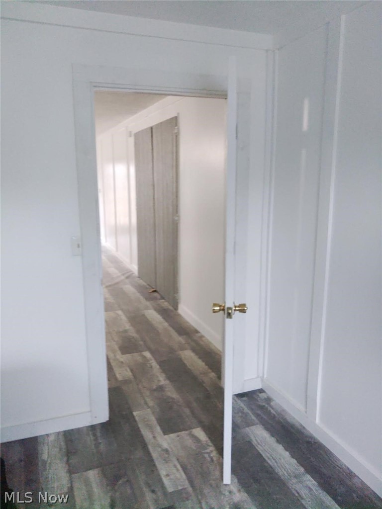 3995 Clay Pike Road Cambridge, OH 43725 - Photo 8 of 10 Hall featuring dark wood-style floors