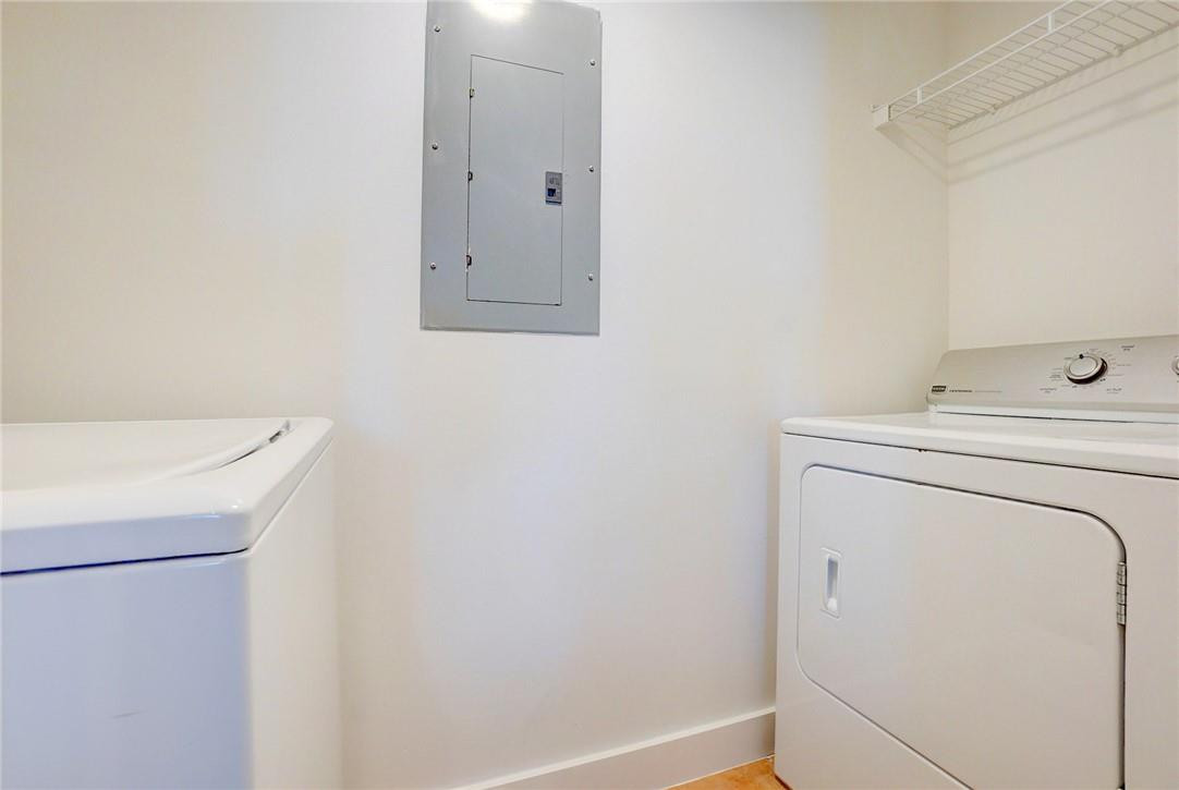 9201 Collins Avenue, Unit 326 Surfside, FL 33154 - Photo 31 of 41 a utility room with dryer and washer