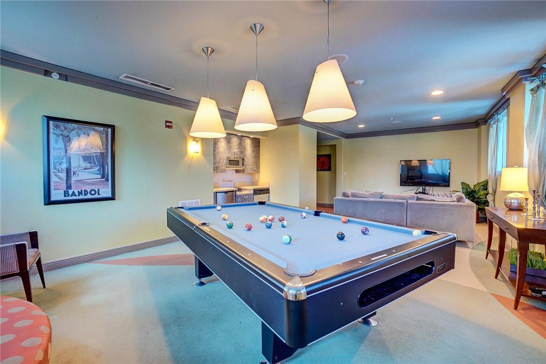 9201 Collins Avenue, Unit 326 Surfside, FL 33154 - Photo 33 of 41 a room with pool table and windows