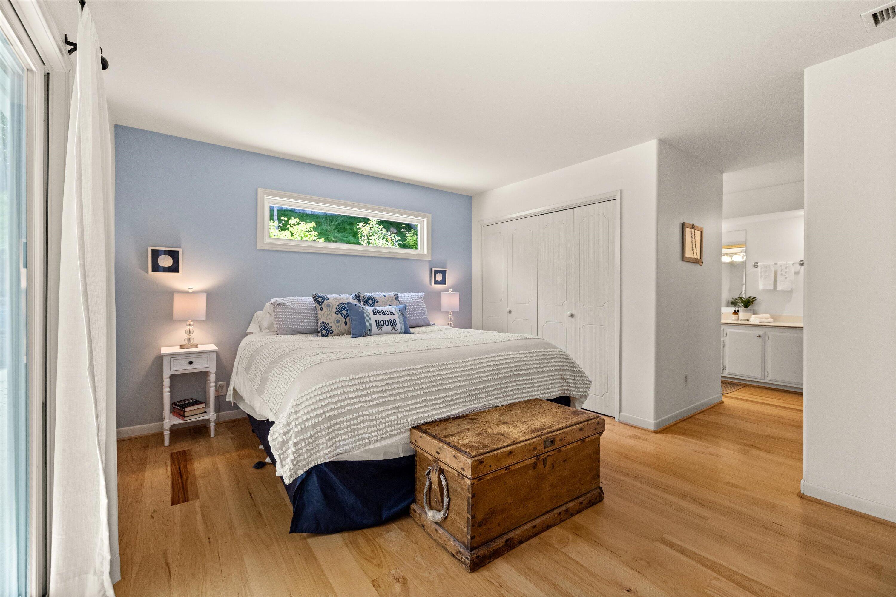 927 Randolph Road Santa Barbara, CA 93111 - Photo 11 of 25 a spacious bedroom with a bed and wooden floor
