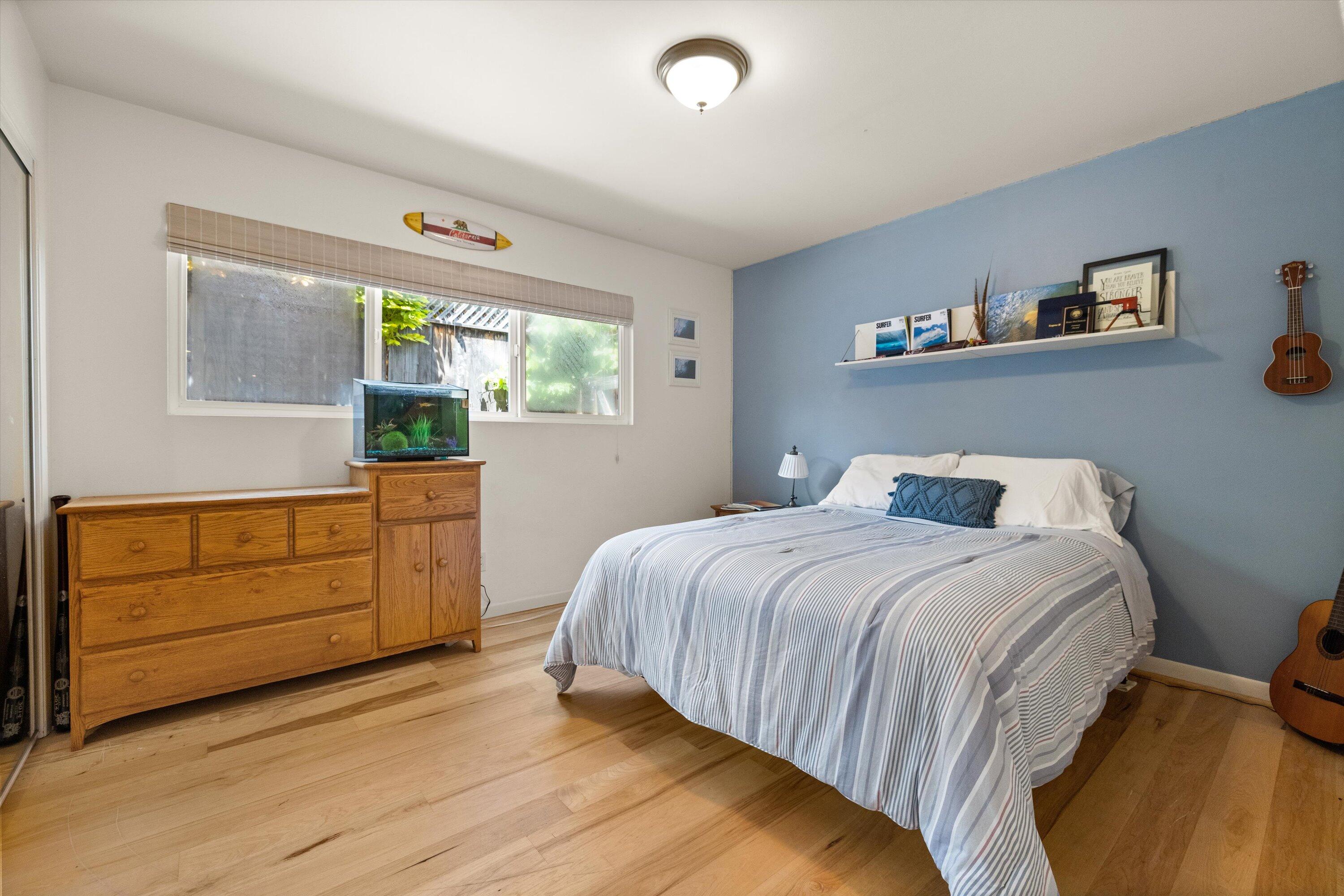 927 Randolph Road Santa Barbara, CA 93111 - Photo 13 of 25 a bedroom with a bed and a dresser