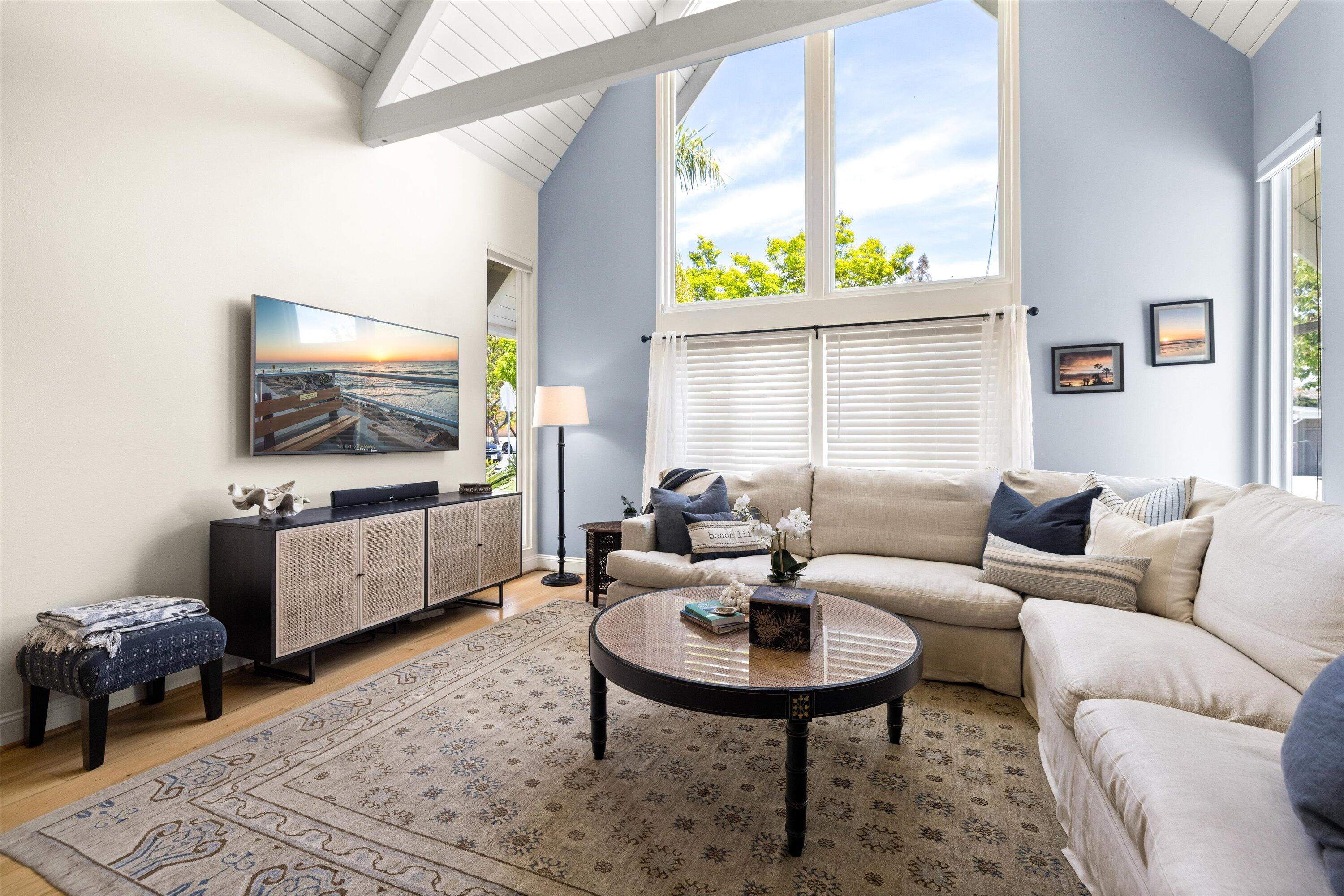927 Randolph Road Santa Barbara, CA 93111 - Photo 3 of 25 a living room with furniture and a flat screen tv