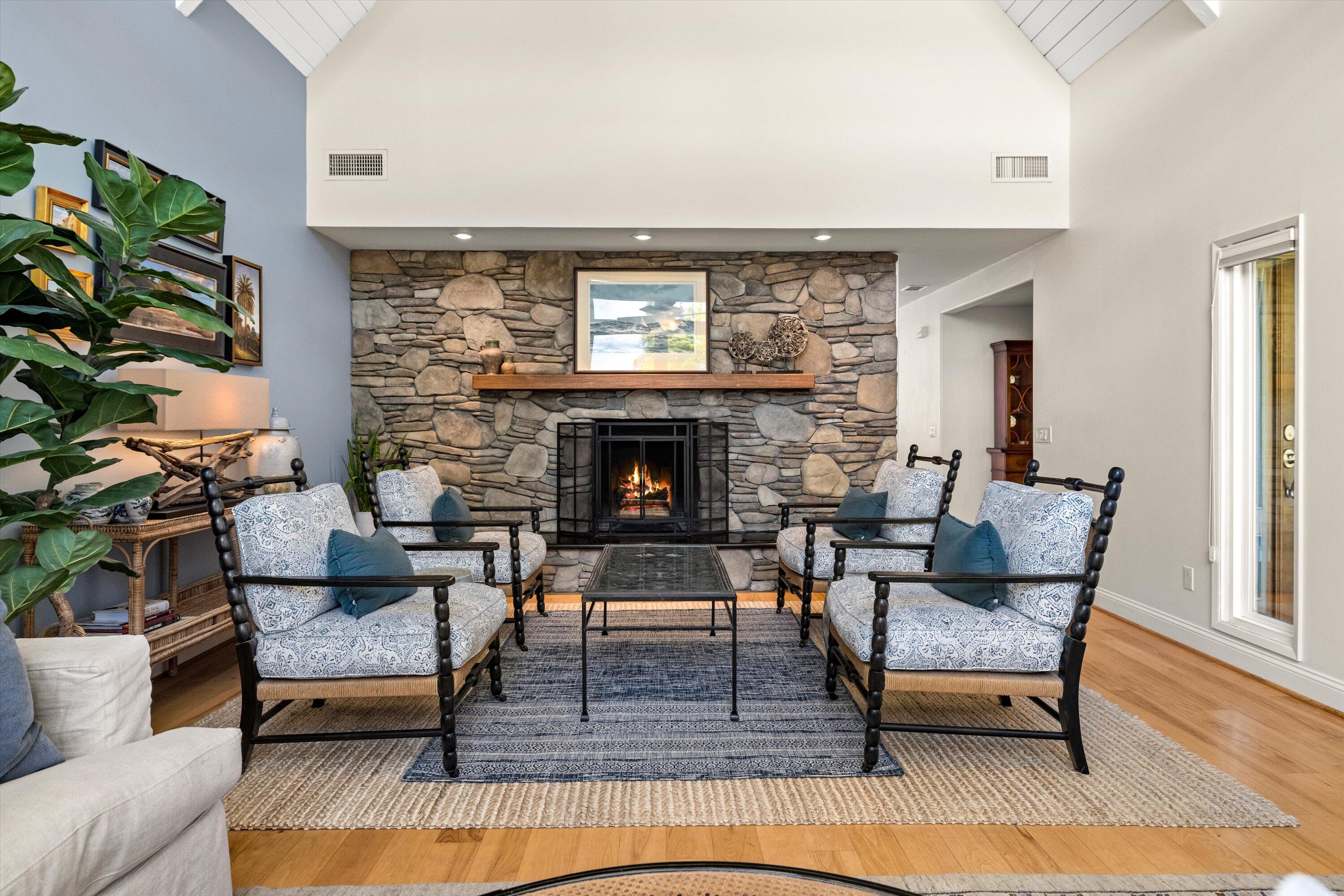 927 Randolph Road Santa Barbara, CA 93111 - Photo 4 of 25 a living room with furniture and a fireplace