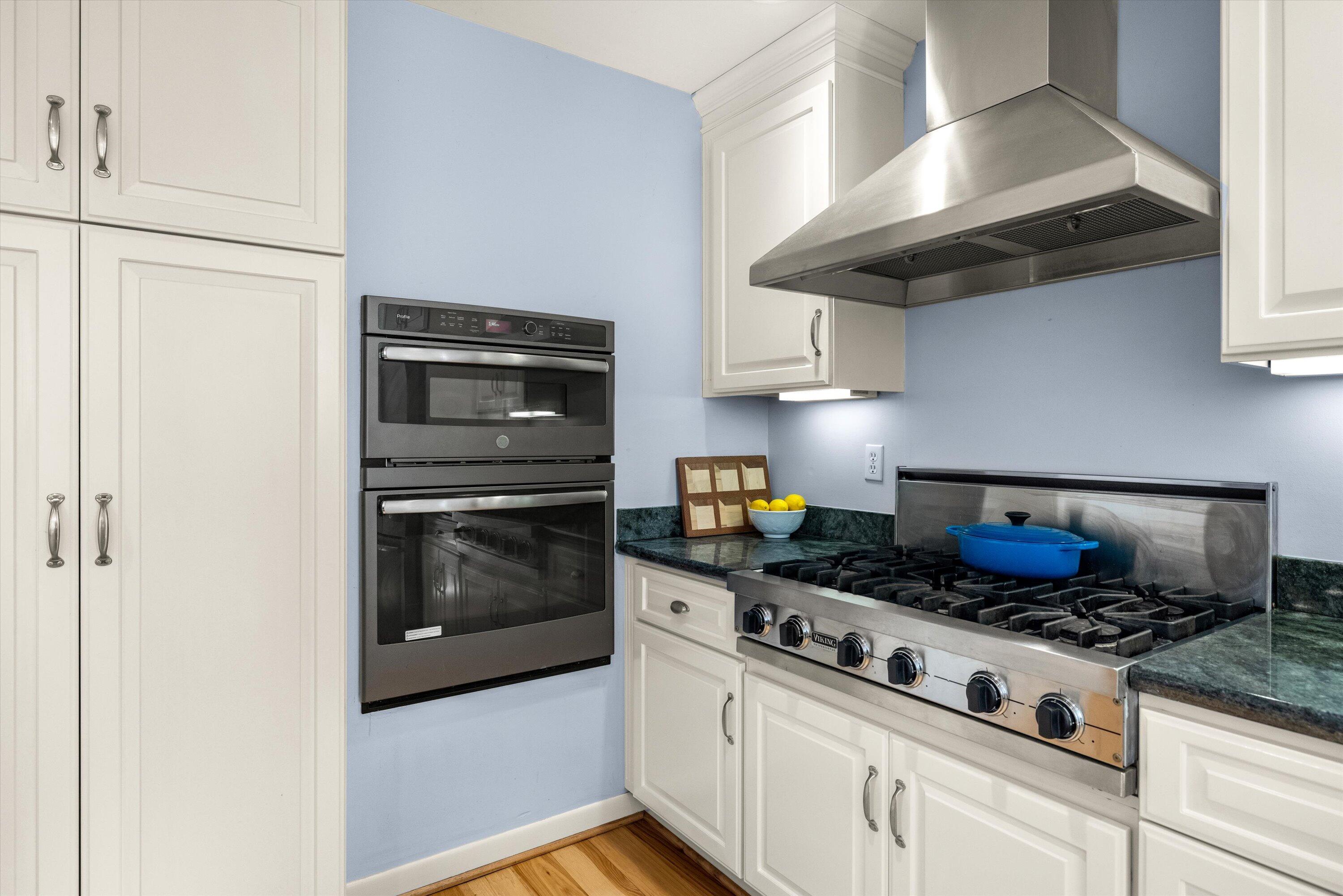 927 Randolph Road Santa Barbara, CA 93111 - Photo 6 of 25 a kitchen with stainless steel appliances granite countertop a stove and a microwave