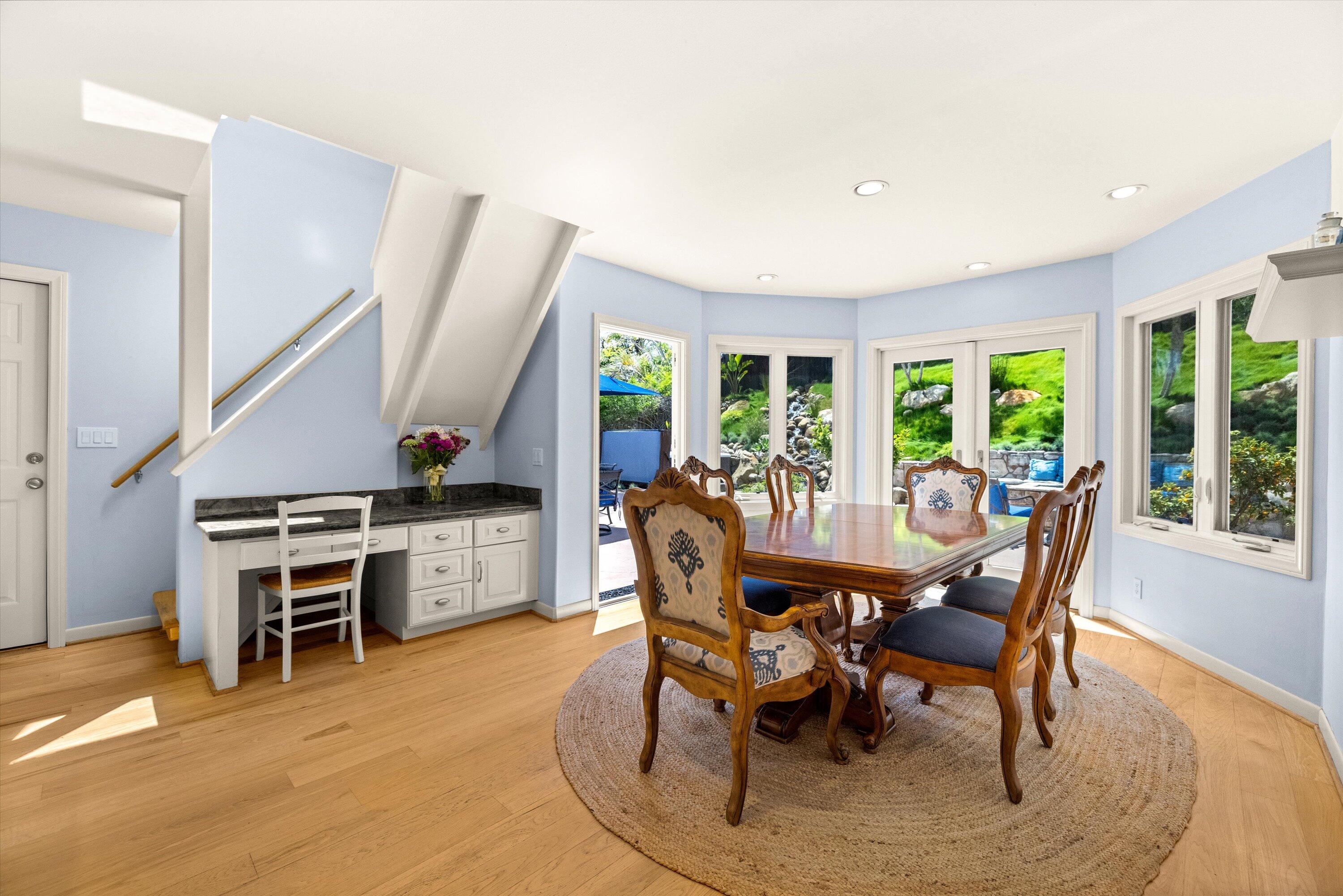 927 Randolph Road Santa Barbara, CA 93111 - Photo 10 of 25 a view of a dining room with furniture window and wooden floor