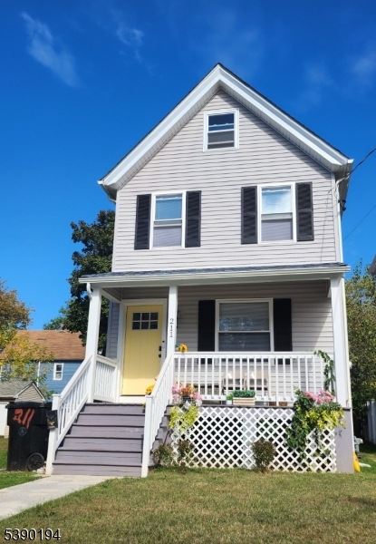a front view of a house with a garage