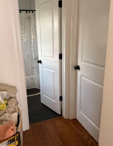 a view of entryway with wooden floor