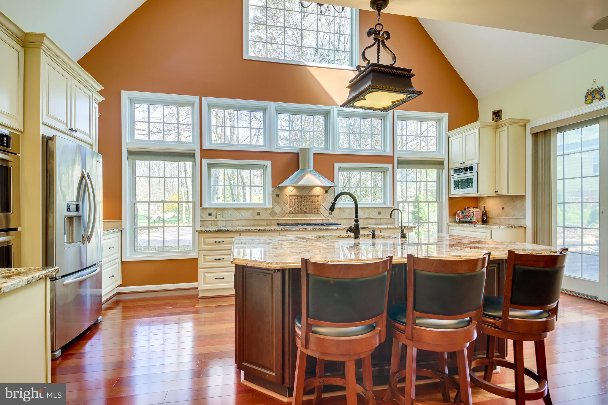11019 Ring Road Reston, VA 20190 - Photo 12 of 62 Large two-story-high kitchen - wall of windows!