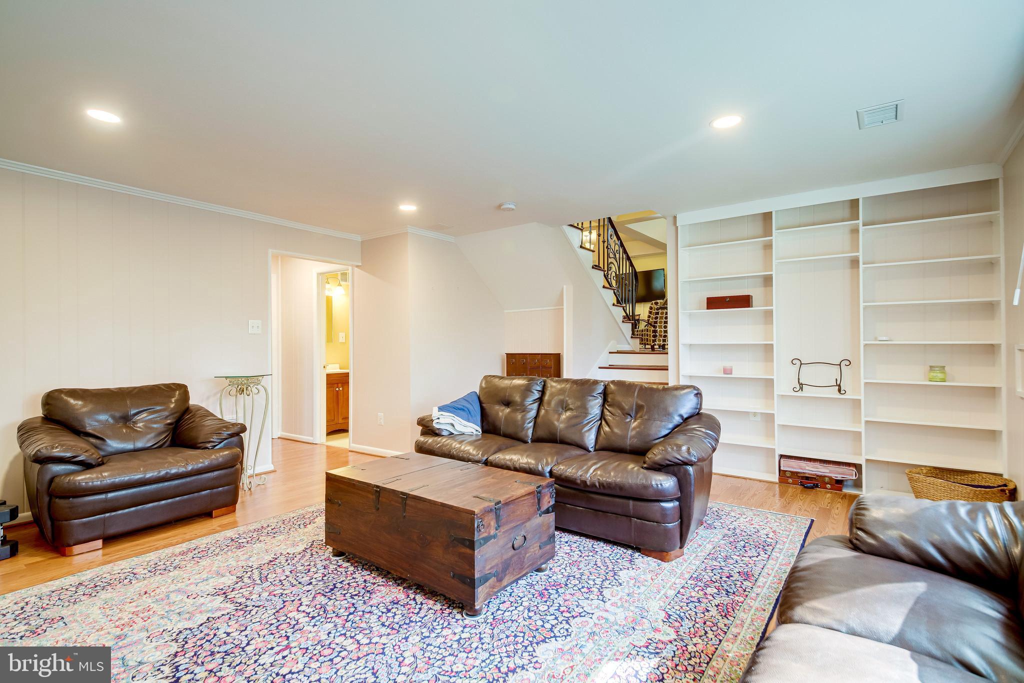 11019 Ring Road Reston, VA 20190 - Photo 20 of 62 Lower Level Rec Room w/ gas fireplace & built-in's