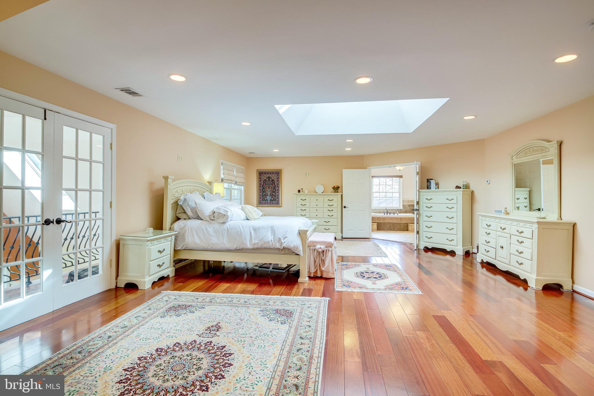 11019 Ring Road Reston, VA 20190 - Photo 38 of 62 Primary bedroom suite. Doors open to sitting area