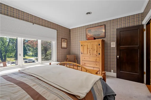 a kitchen with kitchen island granite countertop wooden cabinets a sink and dishwasher