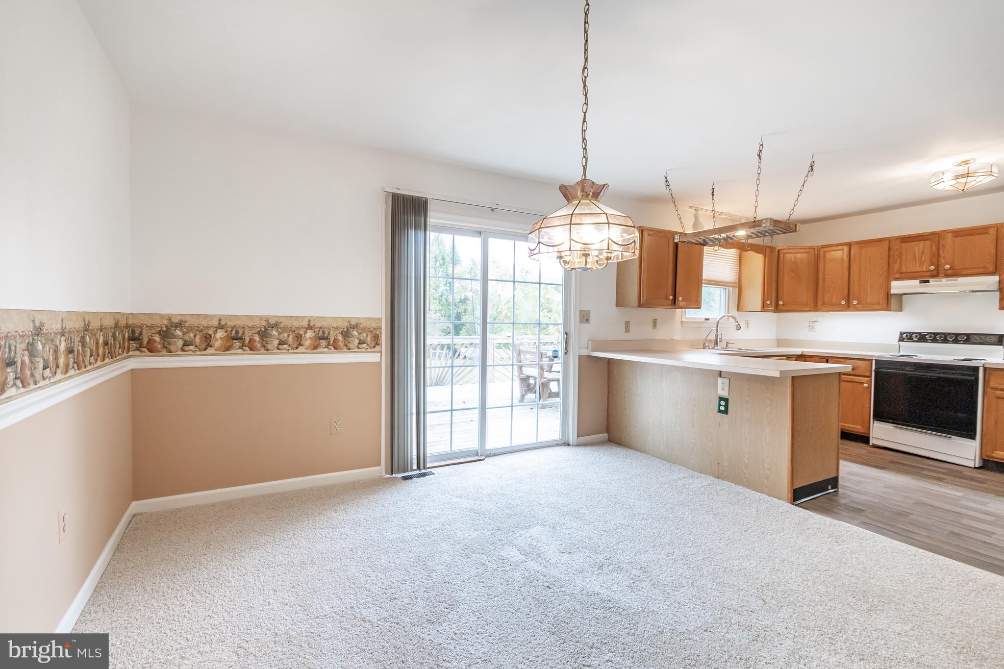 21 Country Lane Colora, MD 21917 - Photo 12 of 68 a kitchen with stainless steel appliances granite countertop a sink a stove and a refrigerator