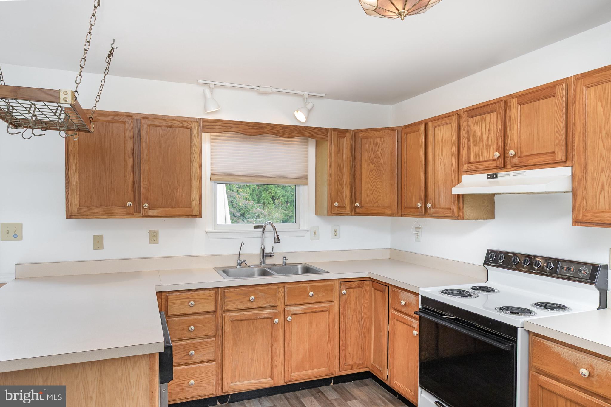 21 Country Lane Colora, MD 21917 - Photo 15 of 68 a kitchen with stainless steel appliances granite countertop a sink stove and cabinets