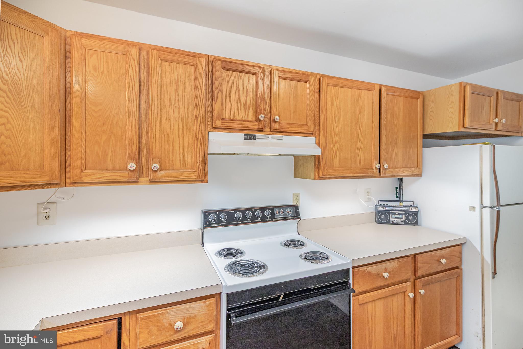 21 Country Lane Colora, MD 21917 - Photo 16 of 68 a kitchen with a stove and a refrigerator