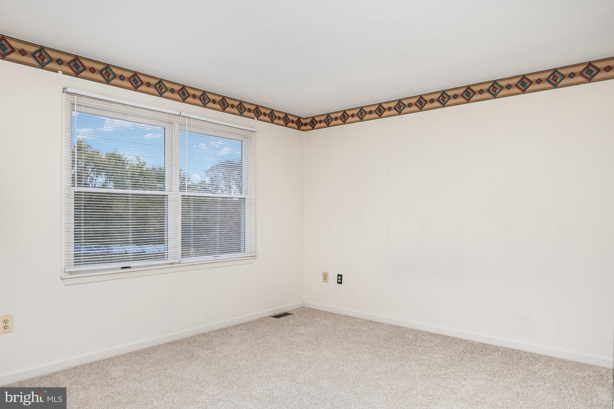 21 Country Lane Colora, MD 21917 - Photo 19 of 68 a view of a room with window and a white wall