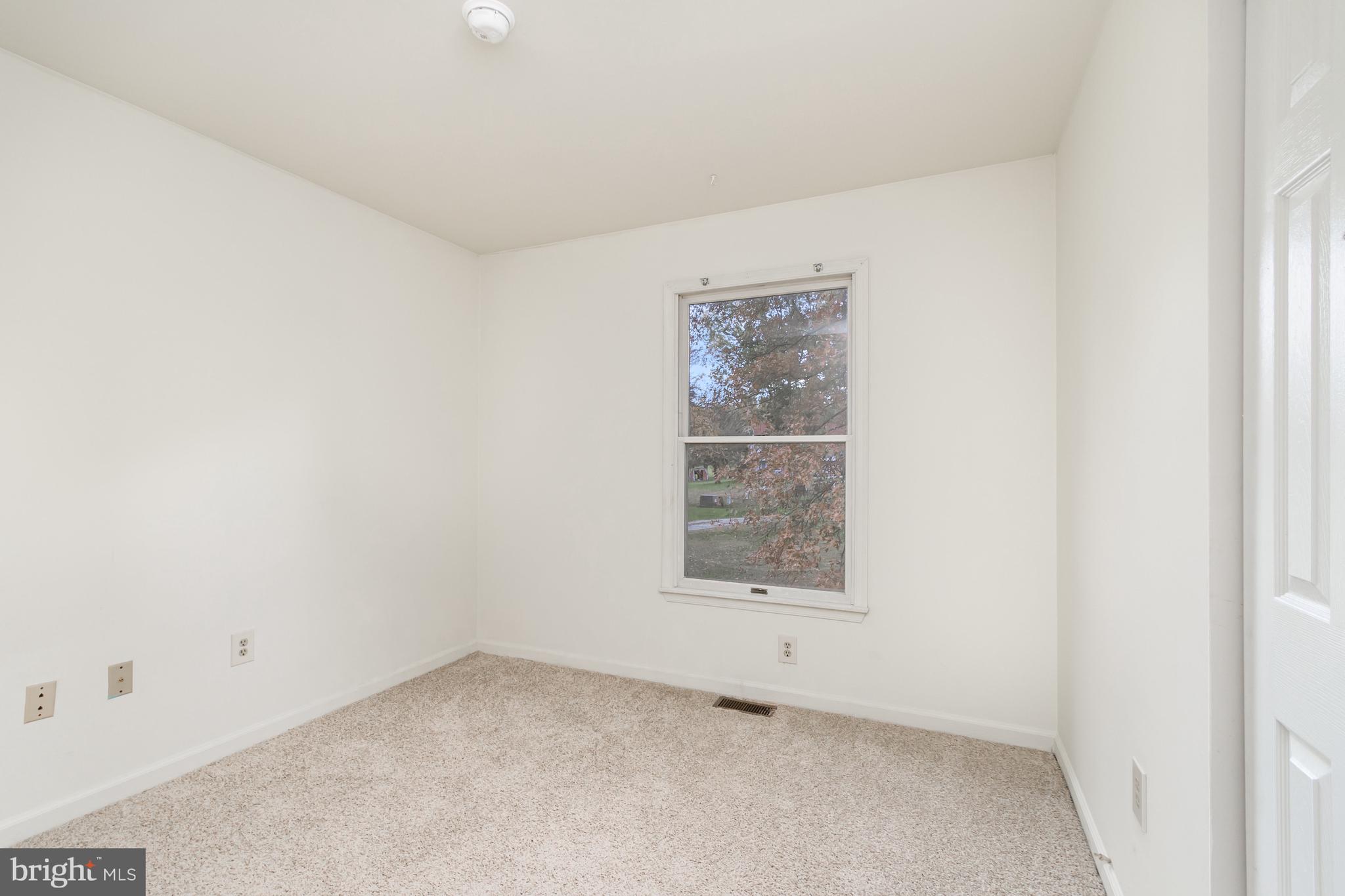 21 Country Lane Colora, MD 21917 - Photo 21 of 68 an empty room with a window