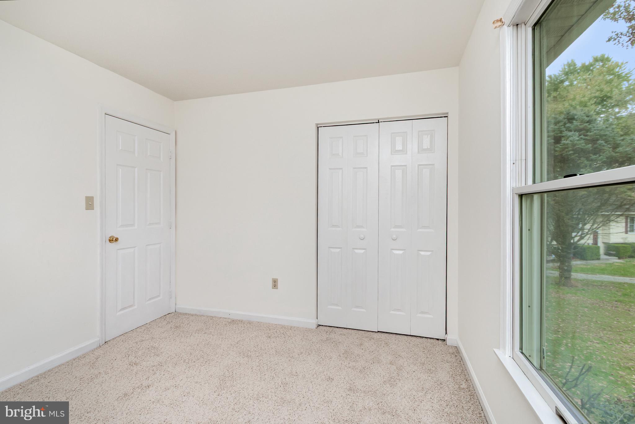 21 Country Lane Colora, MD 21917 - Photo 24 of 68 an empty room with sliding glass door