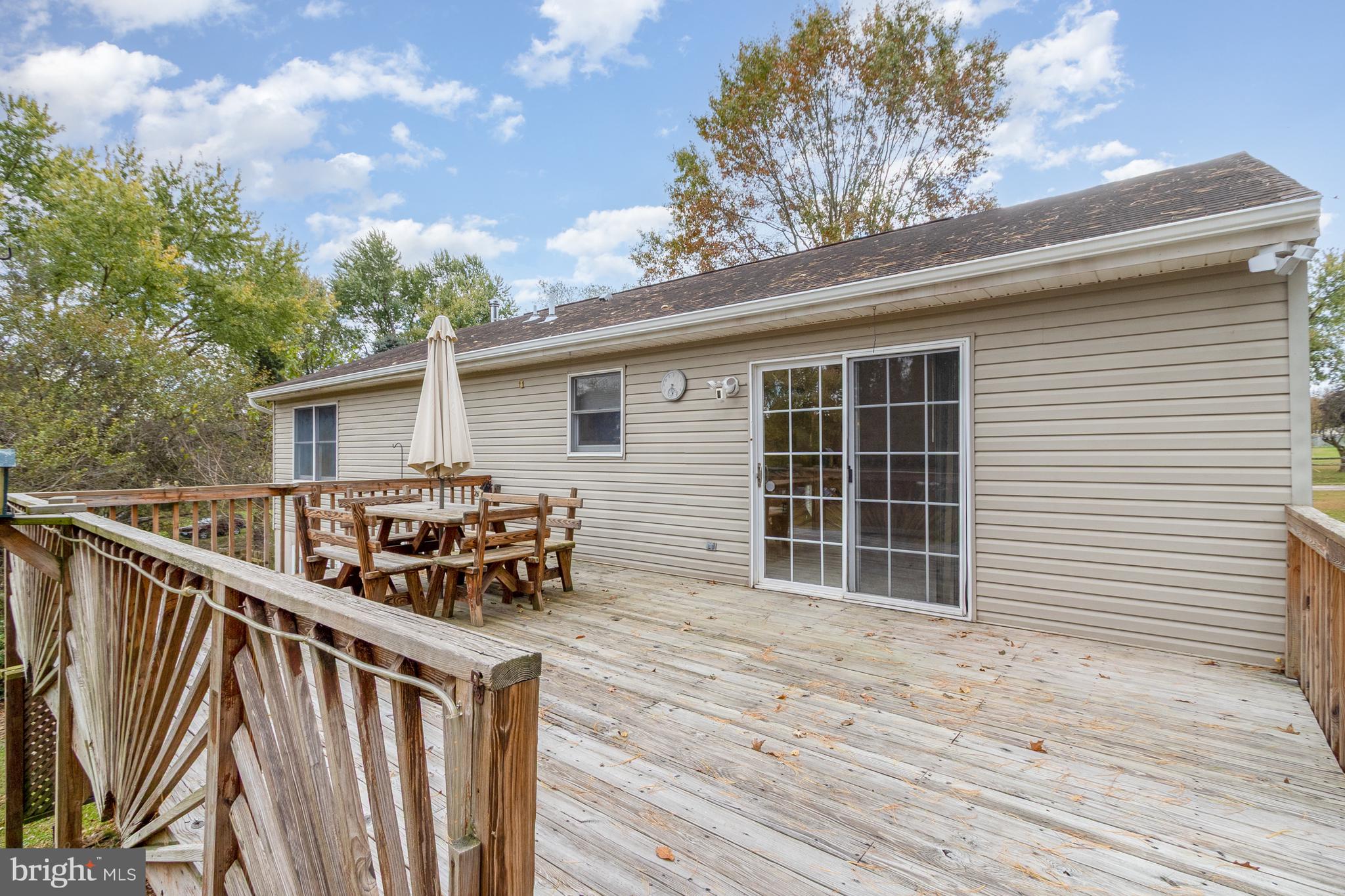21 Country Lane Colora, MD 21917 - Photo 35 of 68 a view of house with deck and wooden floor