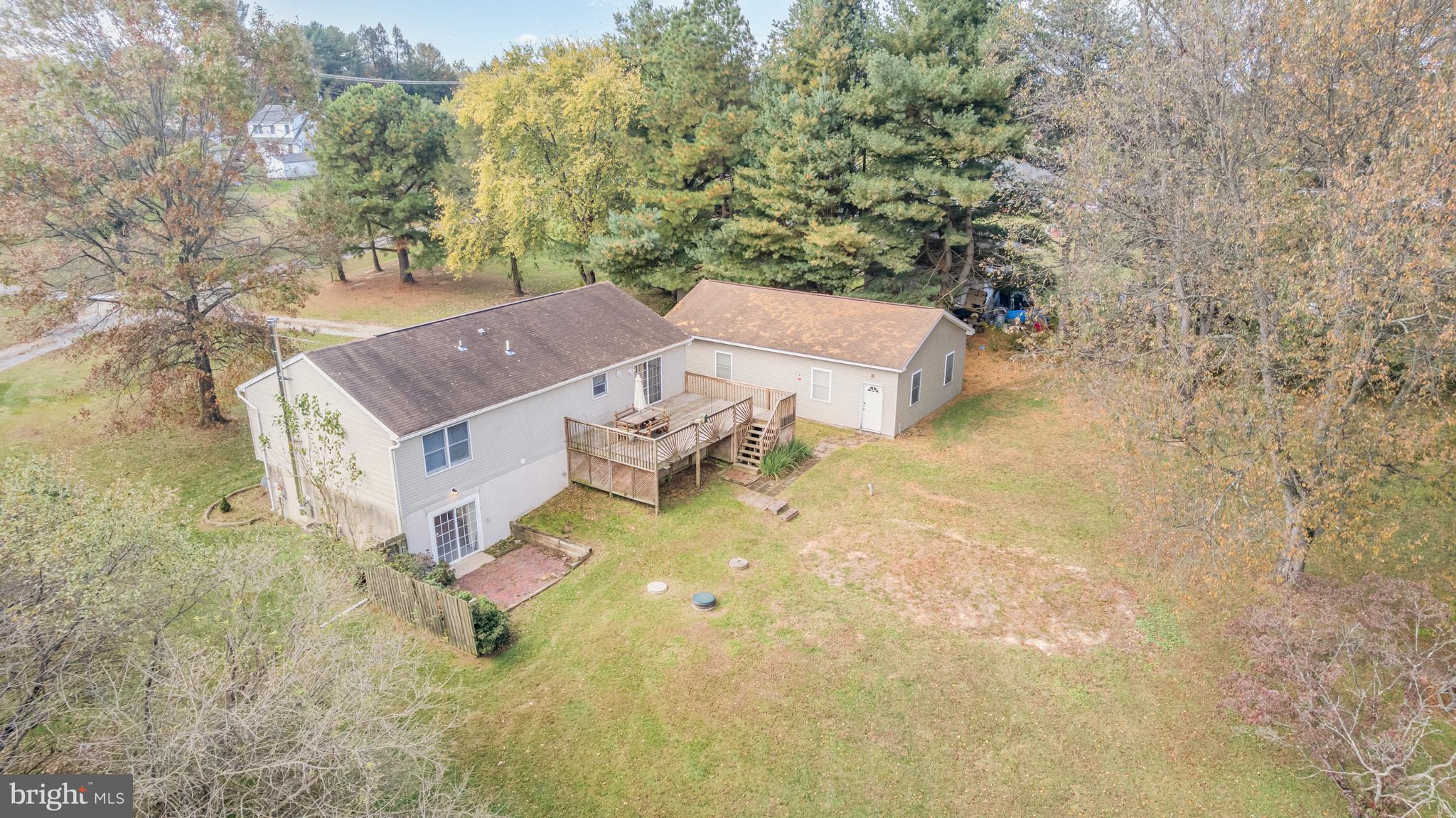 21 Country Lane Colora, MD 21917 - Photo 53 of 68 an aerial view of a house with a yard