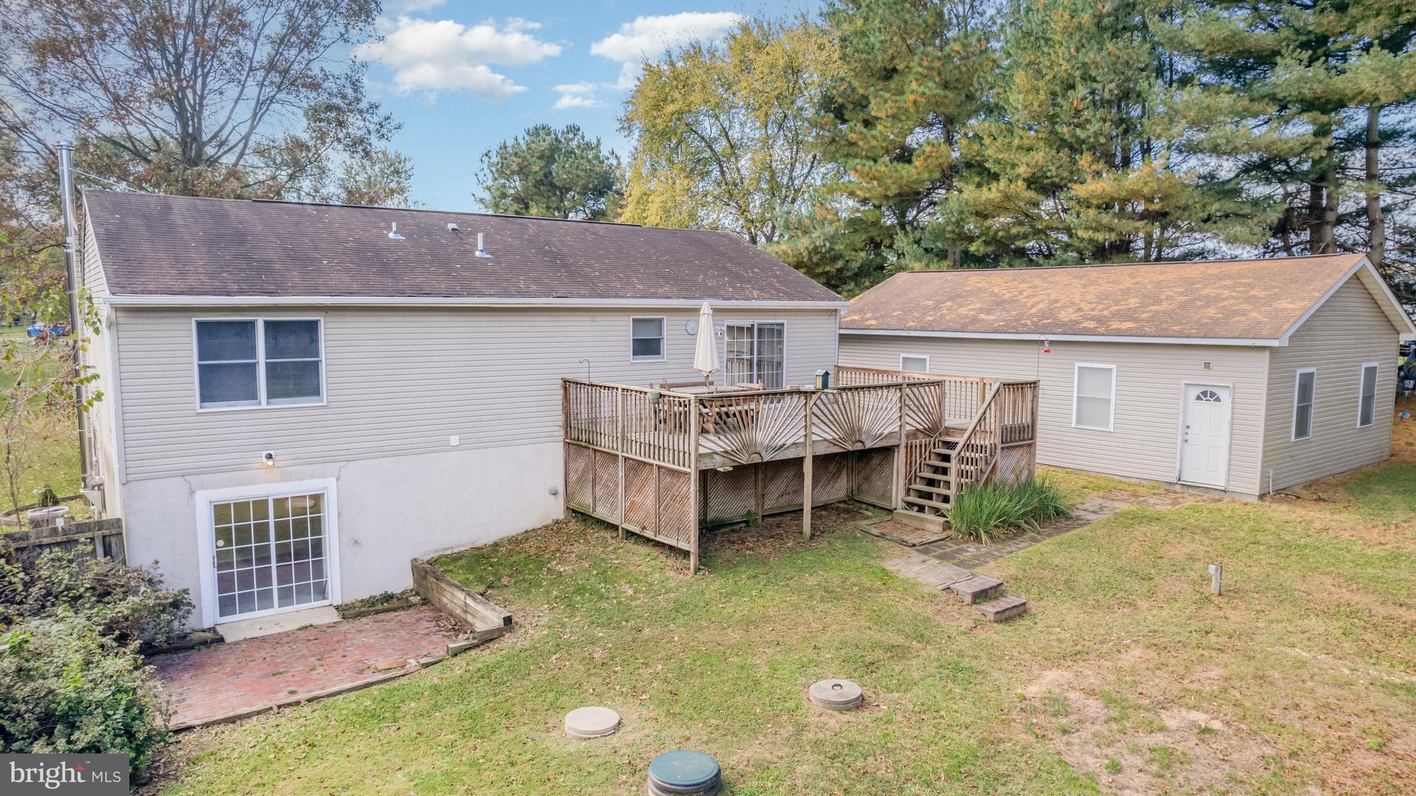 21 Country Lane Colora, MD 21917 - Photo 54 of 68 a view of a house with a yard and roof
