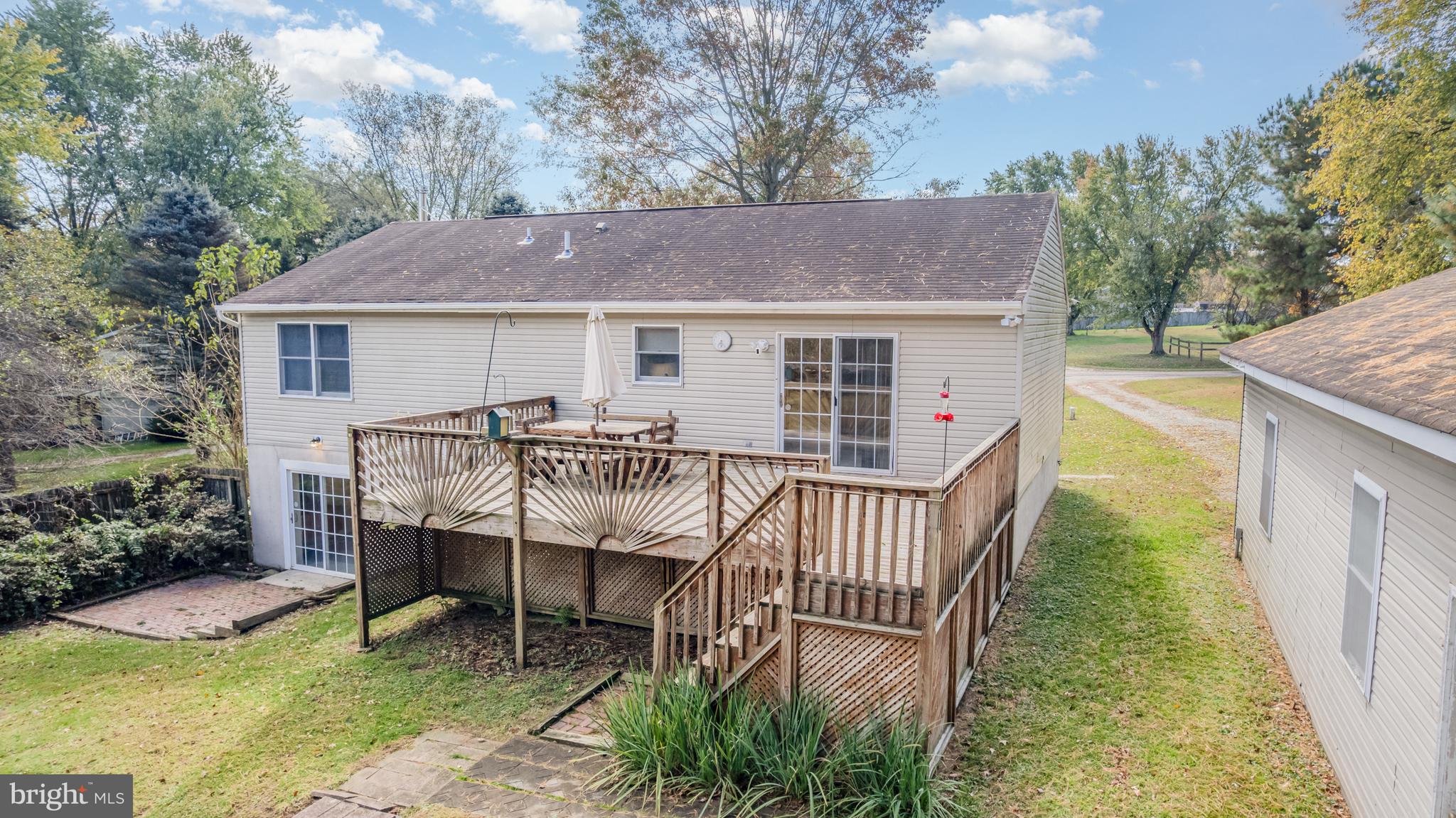 21 Country Lane Colora, MD 21917 - Photo 57 of 68 a view of a house with backyard and porch