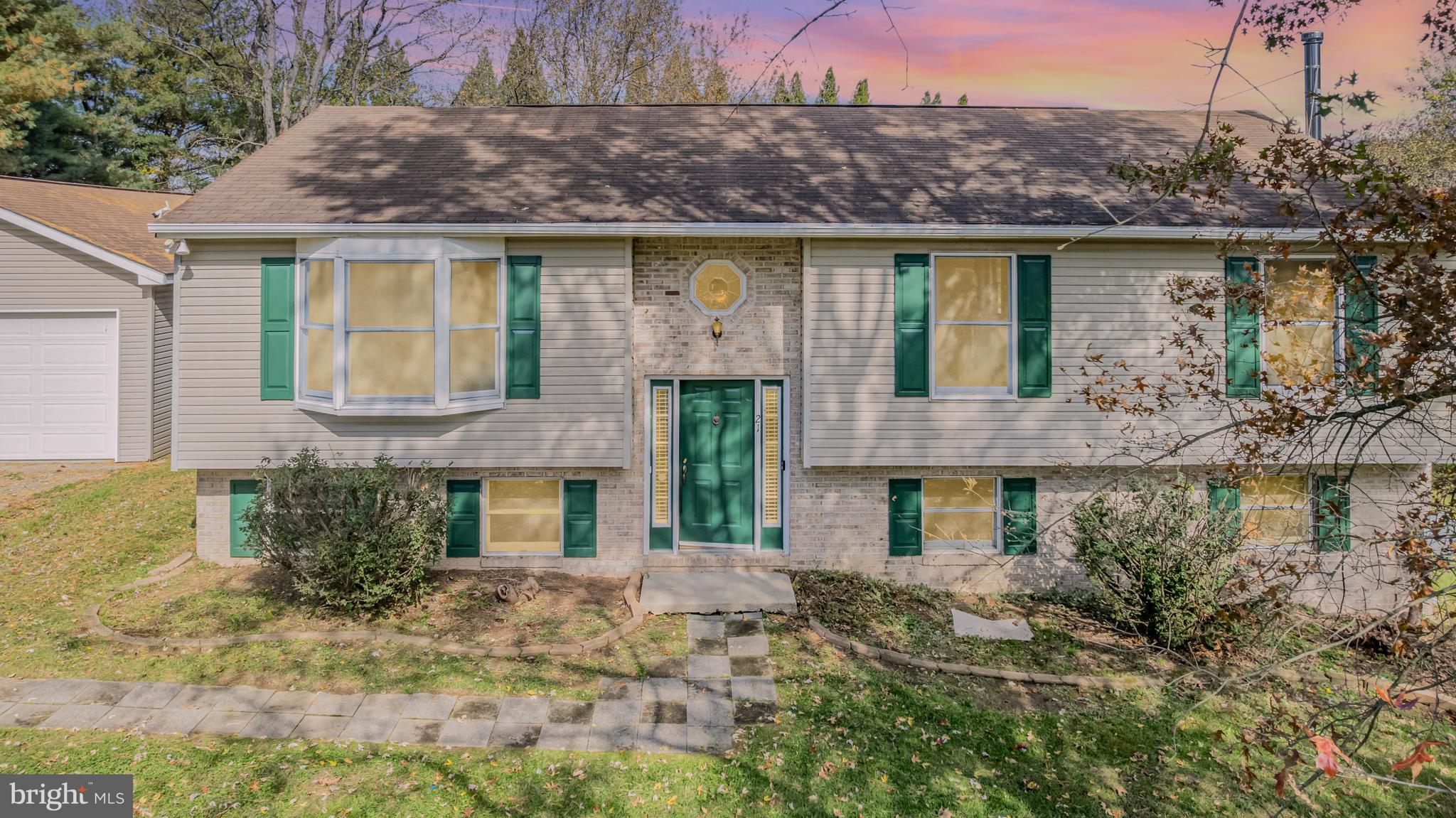 21 Country Lane Colora, MD 21917 - Photo 6 of 68 a front view of a house with a yard