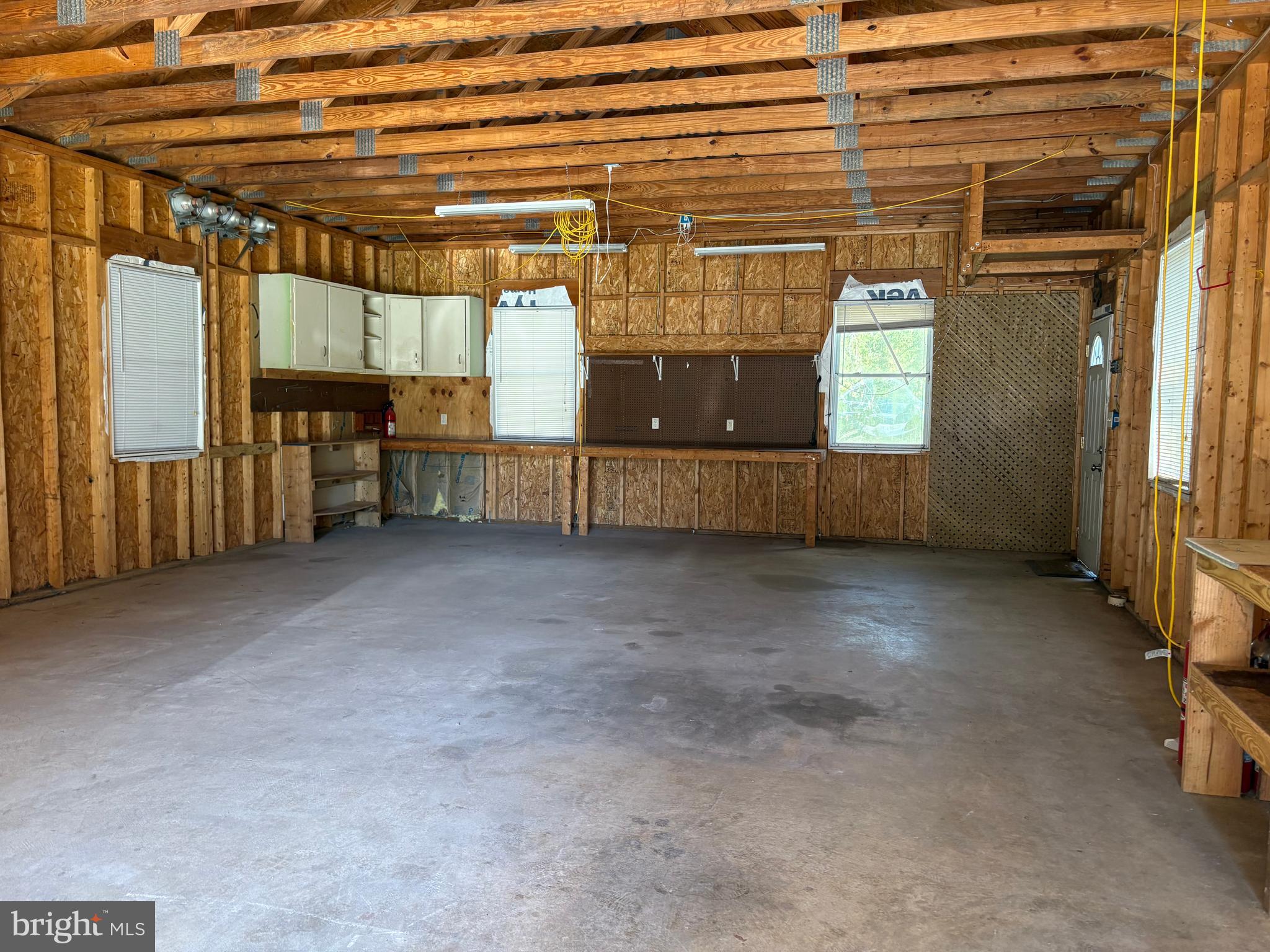21 Country Lane Colora, MD 21917 - Photo 65 of 68 a view of a room with wooden walls and a window