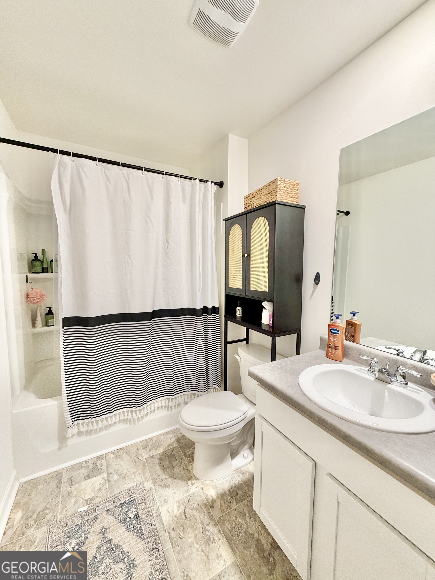 219 Barnyard Way Perry, GA 31069 - Photo 35 of 44 a bathroom with a sink a toilet and shower