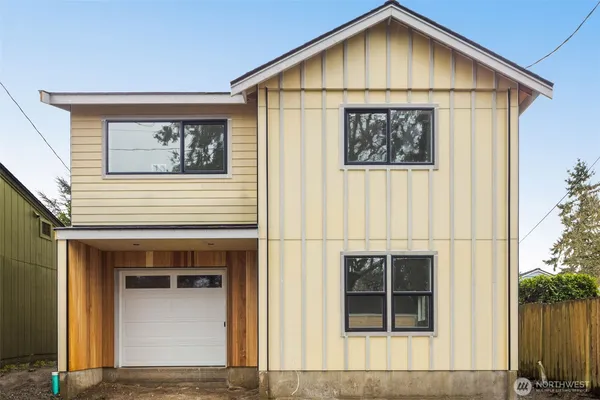 a view of front of house with garage
