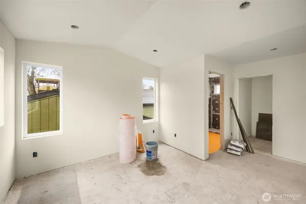 a view of an empty room with a window