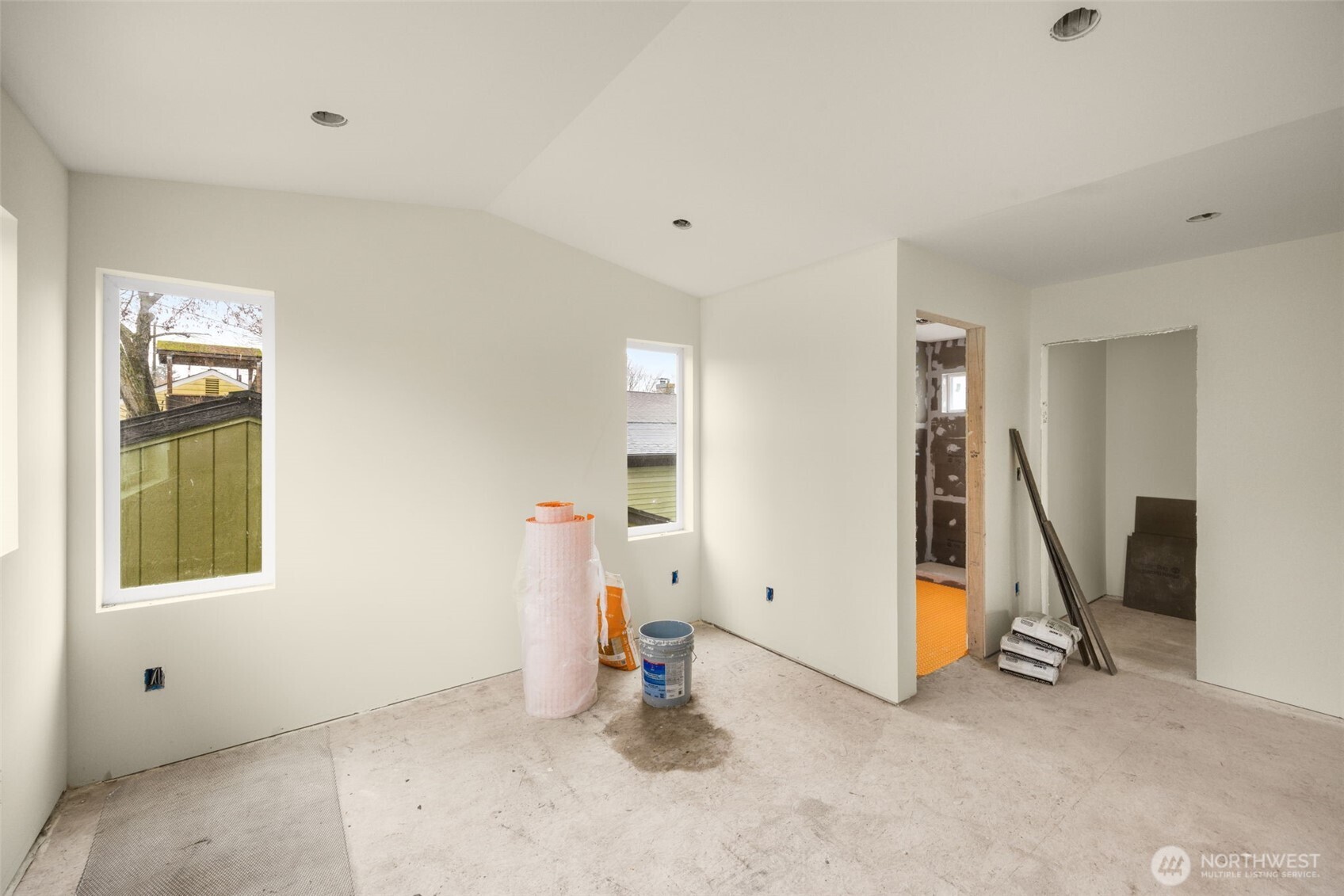 8109 34th Avenue Southwest, Unit B Seattle, WA 98126 - Photo 12 of 25 a view of an empty room with a window