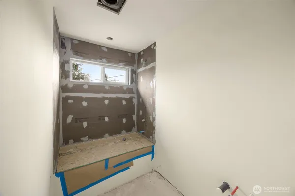 a bathroom with a sink and mirror