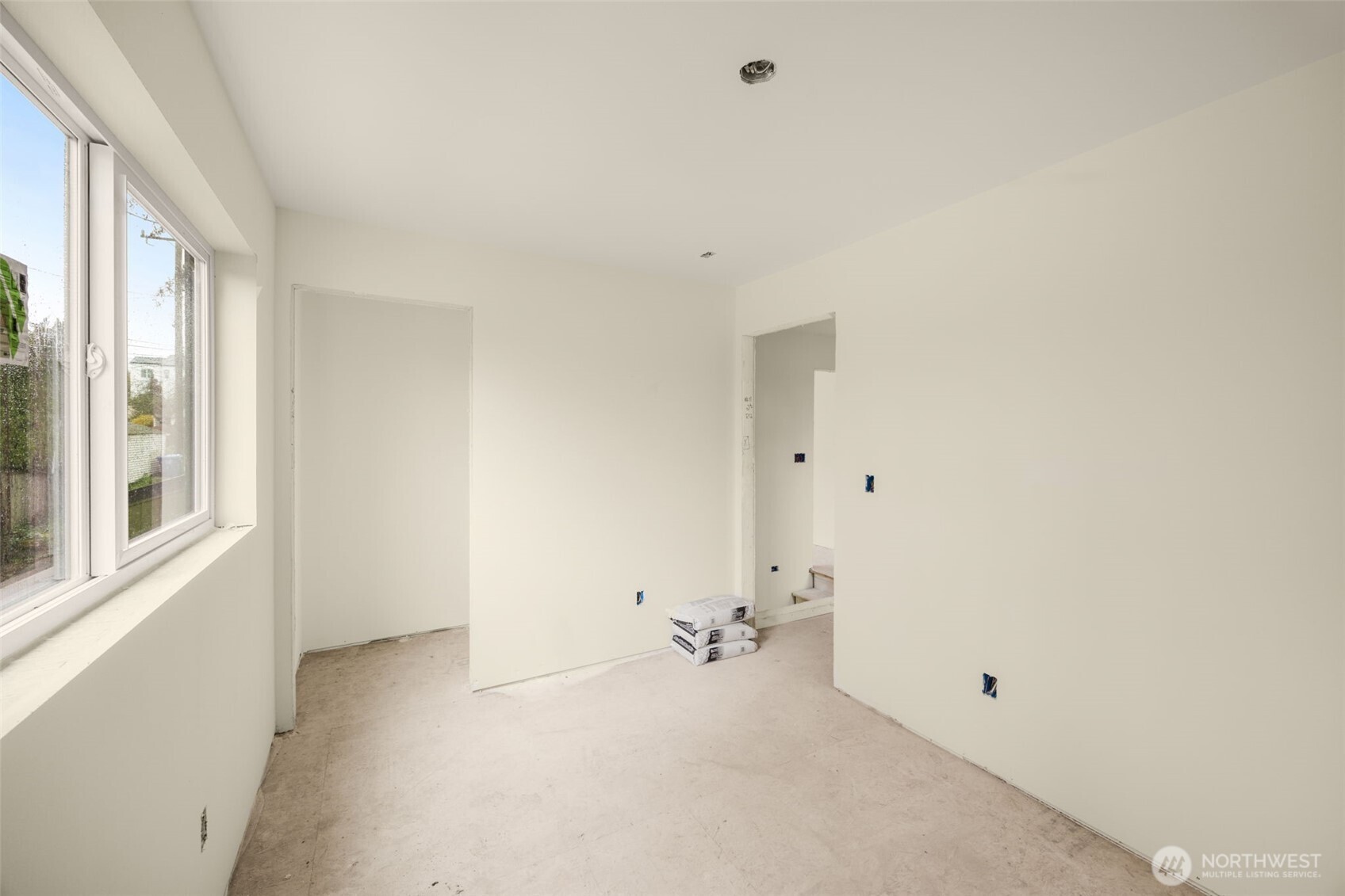 8109 34th Avenue Southwest, Unit B Seattle, WA 98126 - Photo 20 of 25 a view of an empty room