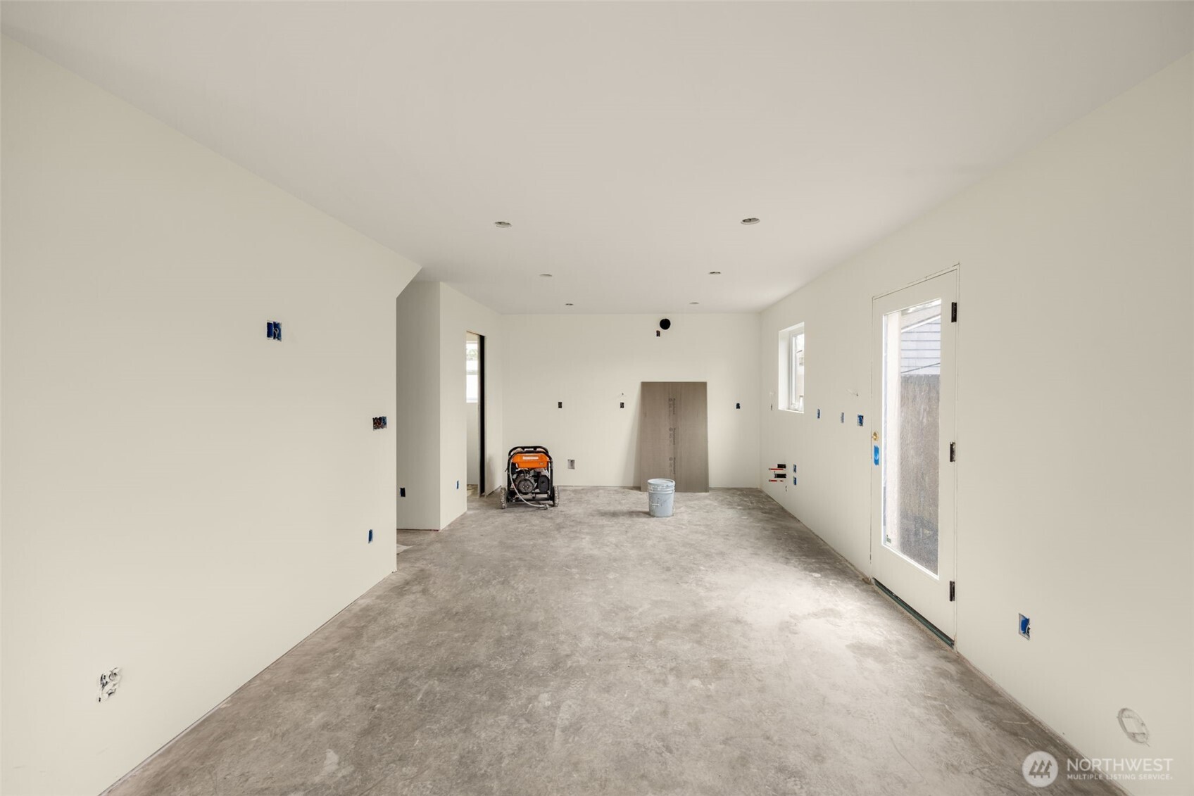 8109 34th Avenue Southwest, Unit B Seattle, WA 98126 - Photo 8 of 25 a view of a big room with closet and windows
