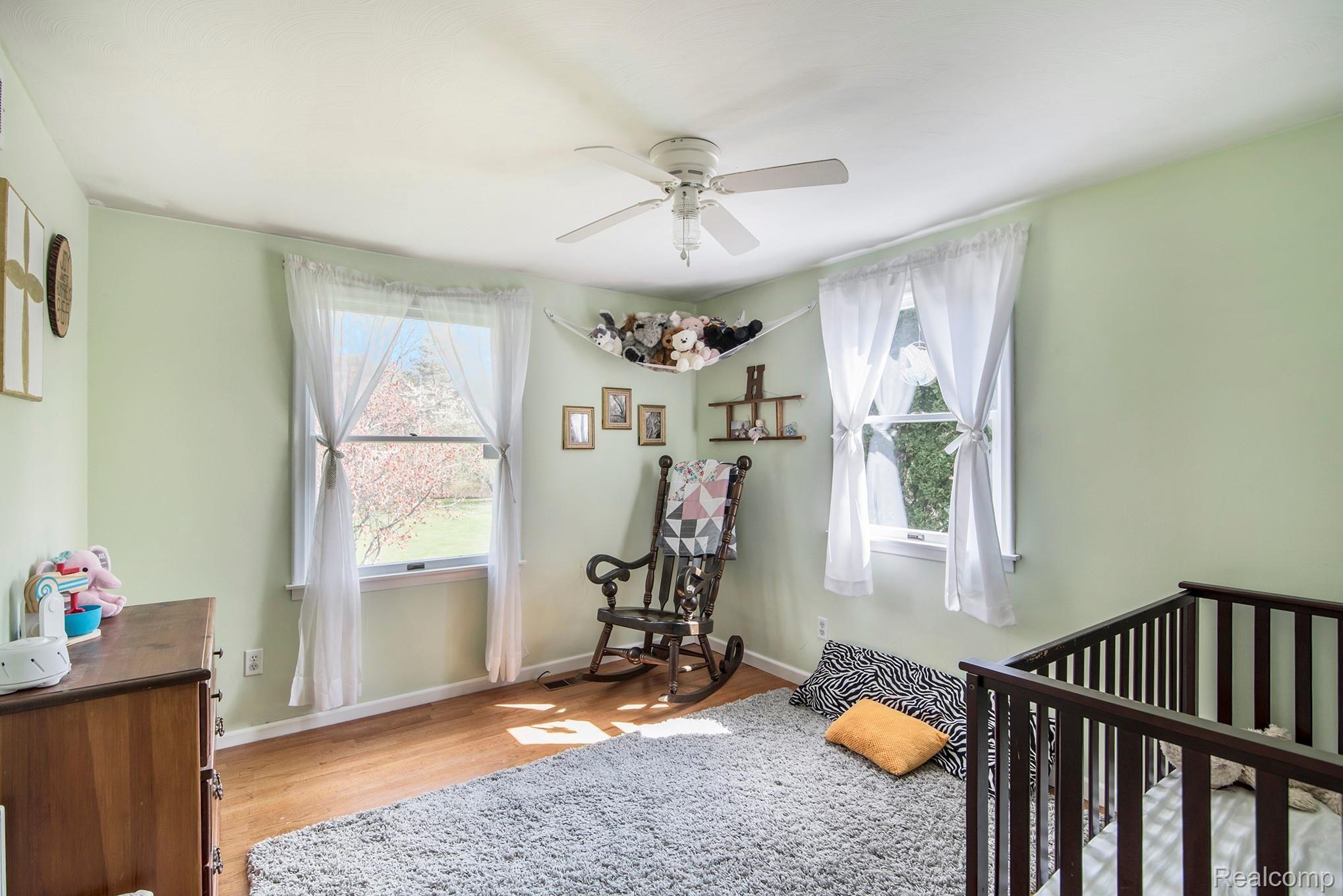 1860 Echo Hills Road Howell, MI 48855 - Photo 13 of 25 Bedroom #3 with hardwood